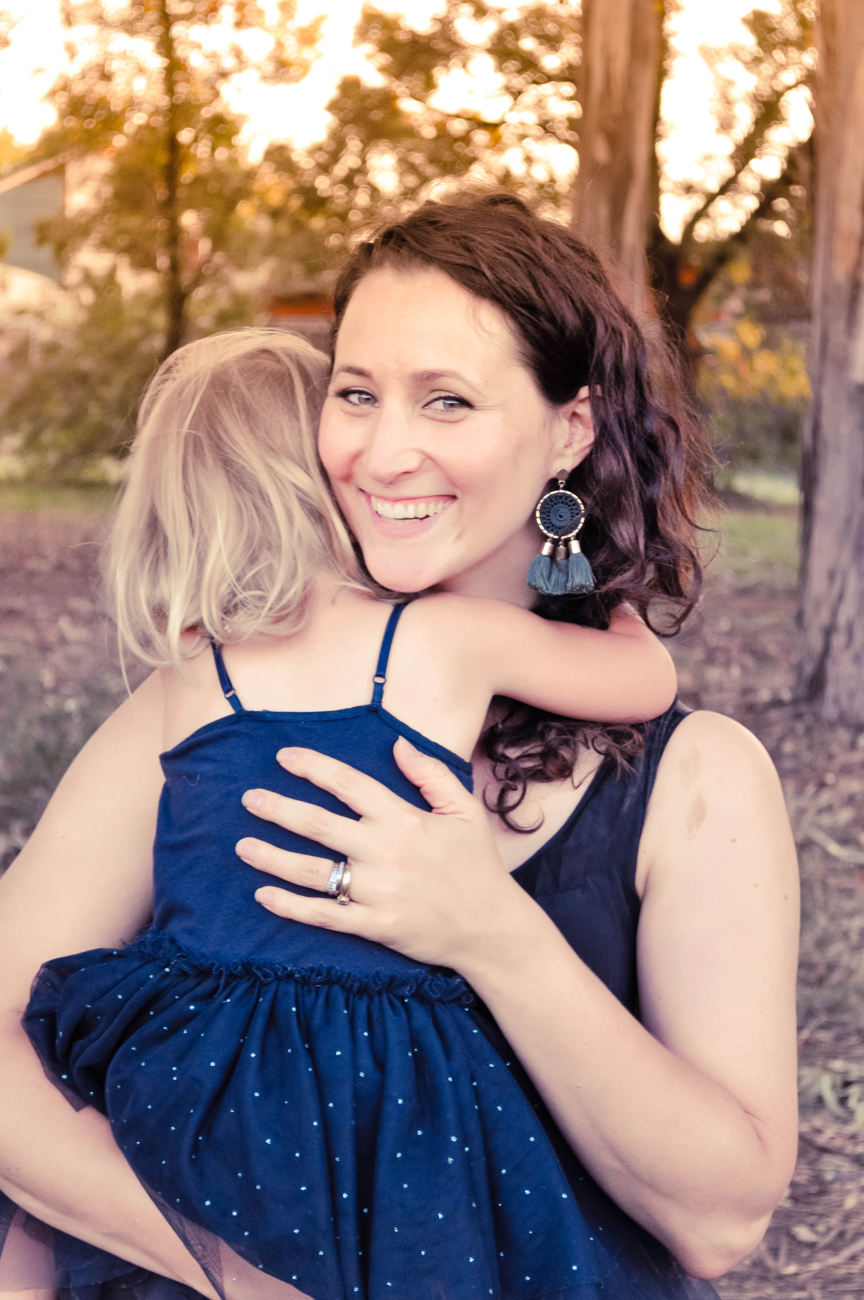 Anna holding her child
